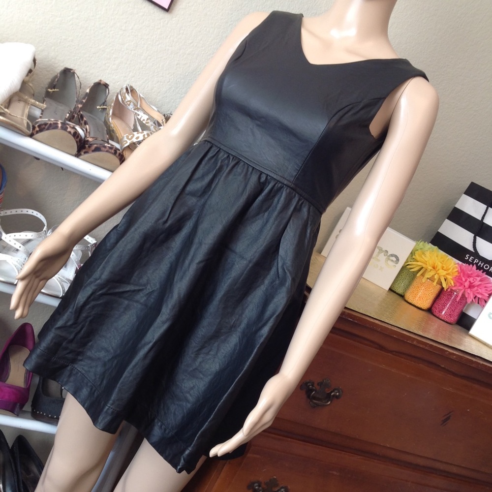 Form fitted mini leather style dress R020